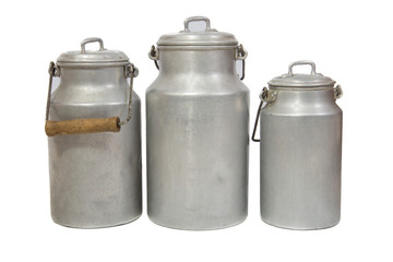 three retro aluminium milk cans on white background