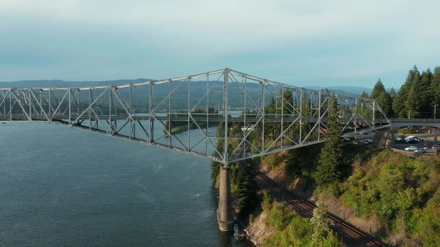 The Bridge of the Gods is a steel truss cantilever bridge that spans the Columbia River between Cascade Locks, Oregon, and Washington state near North Bonneville. 