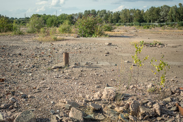 Abandoned and contaminated site of former metal processing and smelting works, awaiting...