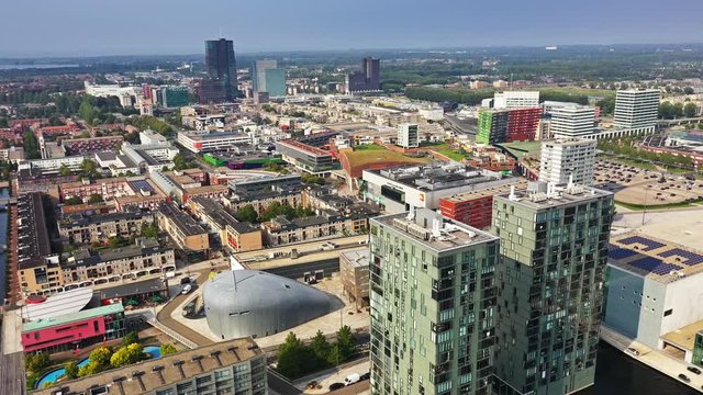 Aerial view of Almere City, the Netherlands,  with its business buildings, shops and lesure lake.
