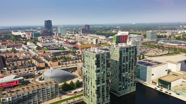 Aerial view of Almere City, the Netherlands,  with its business buildings, shops and lesure lake.