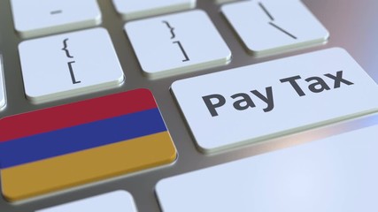 PAY TAX text and flag of Armenia on the buttons on the computer keyboard. Taxation related conceptual 3D animation