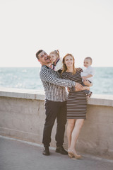 Happy family spending time together outdoors.