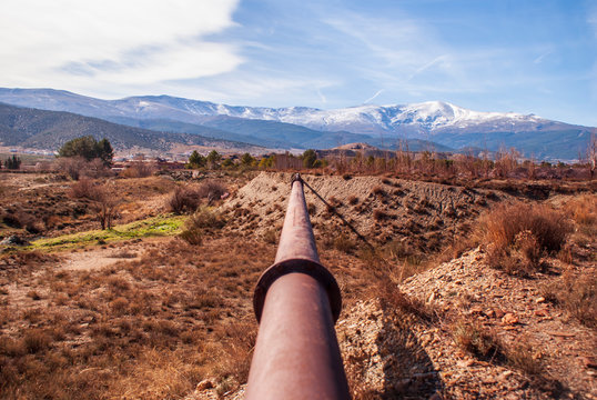 old iron pipe to carry water to the mines of Alquife (Spain)