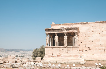 The Erechtheion is an ancient Greek temple on the north side of the Acropolis of Athens in Greece which was dedicate to both Athena and Poseidon.