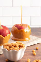 Caramel Apples on a Rustic Kitchen Cabinet Ready for Fall