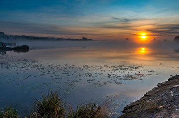 Sunrise with the mist above a river,  summer morning in Jurmala - famous tourist resort in Latvia
