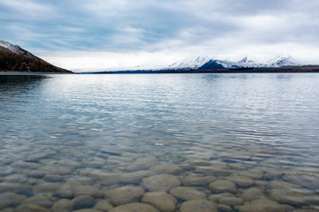 Stunning scenery of Lake Tekapo nestked below the New Zealand Southern Alps