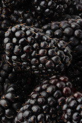 texture with blackberry closeup, background of berries, vertical frame