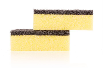Group of two whole yellow cleaning kitchen sponge isolated on white background