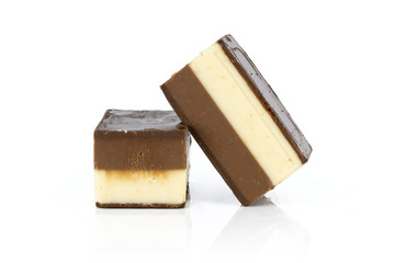 Group of two whole mellow two coloured nougat piece bars isolated on white background