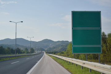 Highway and  road signs at cloudy day. © as-artmedia