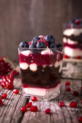 St. Valentine's Day, Mother's Day, Birthday Dessert. Delicate mousse with raspberries, tiramisu, strawberries and kiwi. A festive dessert in the shape of a heart.