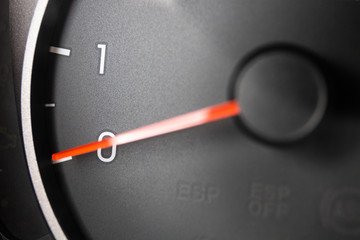Naklejka premium tachometer pointer on car dashboard