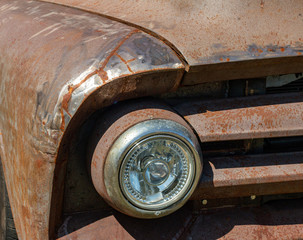 Old Rusted Car Hood with a Light