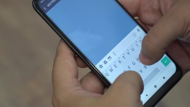 Man texting with his mistress and rejecting a call from his wife