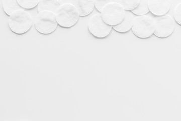 Hygiene cotton pads for frame on white background top view copyspace