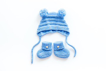 Cute baby clothes for boy on white background top view