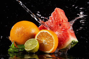 Fototapeta na wymiar Watermelon, Grapefruit, Mint And Orange
