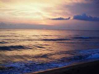Fototapeta premium picturesque Pink sunset on lake beach sea sand beautiful colors in the sky clouds