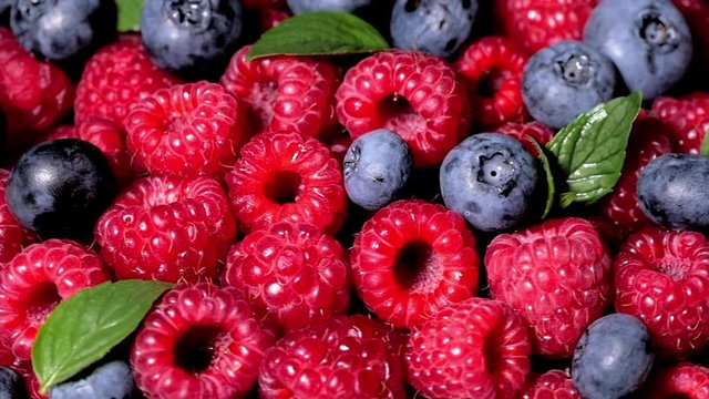 Close Up Rotation Loopable Raspberry. Fresh, Juicy Raspberry Background, Ripe. Macro Red Raspberries Fruit. Fresh Raspberry Fruits As Food Dackground. Healthy Food Organic Nutrition.