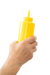 hand holding plastic ketchup box