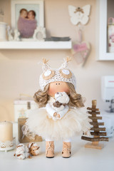 Fototapeta na wymiar Handmade interior dolls. Beautiful, pretty gift for a girl or woman