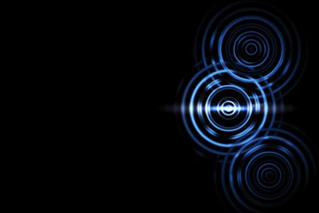 Abstract light effect with blue rings sound waves oscillating on black background