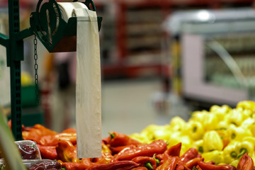 Biodegradable plastic food bags in the fruits and vegetables aisle in a big hypermarket in Romania