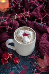 Cup of coffee. Cozy warm autumn winter composition in  yellow orange and burgundy tones