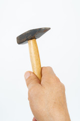 man hand holding hammer.