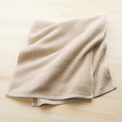 Fototapeta na wymiar towel on wooden floor