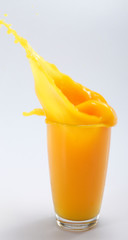Fototapeta na wymiar splash orange juice 