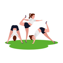 beauty girls group practicing pilates in the grass