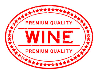 Grunge red premium quality wine oval rubber seal stamp on white background
