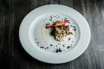 delicious salad with fishtail, wheat sprouts, seeds and nuts