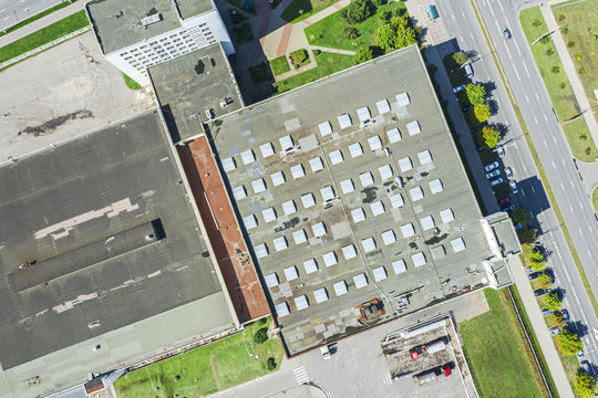 aerial top view of roof of modern industrial building. drone image