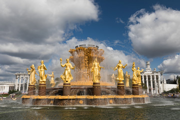 The Peoples Friendship Fountain in VDNKh park in Moscow. Amazing sunny view of the Soviet architecture, landmark of Moscow. Beautiful luxurious old fountain in summer. - 286418267