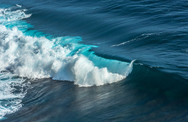 Beautiful sea waves with foam of blue and turquoise in bali,Indonesia.