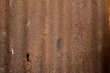 Closeup old rusty zinc sheet texture background.