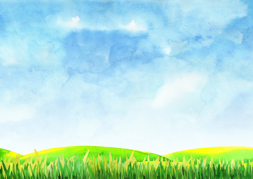 Green grass filed with blue sky watercolor hand painting background.