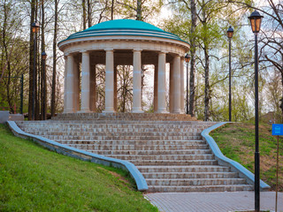 Gazebo standing in the Park for relaxation  Rest in the gazebo standing on a hill
