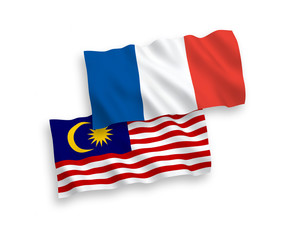 Flags of France and Malaysia on a white background