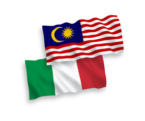 Flags of Italy and Malaysia on a white background