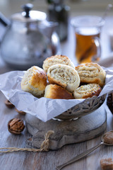 Oriental pastry made from puff pastry and wrapped in it a filling of sugar, butter and walnut. Armenian national pastry ghat or kyat with New Year's serving.. Selective focus