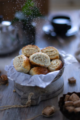 Oriental pastry made from puff pastry and wrapped in it a filling of sugar, butter and walnut. Armenian national pastry ghat or kyat with New Year's serving.. Selective focus