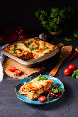 spicy lasagne with tomato sauce and basil