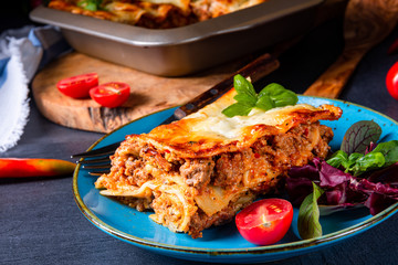 spicy lasagne with tomato sauce and basil