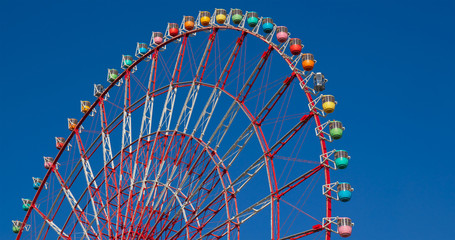 Ferris wheel with clear blue sky