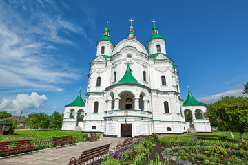 Fototapeta na wymiar Beautiful white green-domed orthodox church in Ukrainian town of Kozelets